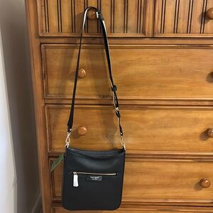 Brand new Kate spade black shoulder purse!! Very stylish and comes new with tags